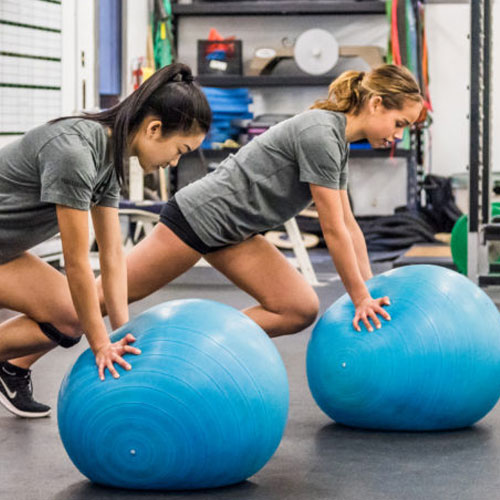 Image of two youth athletes training