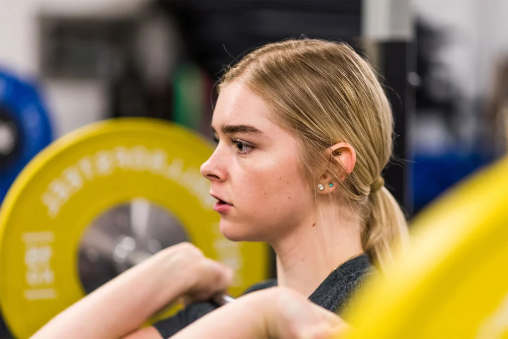 Banner of girl weight lifting