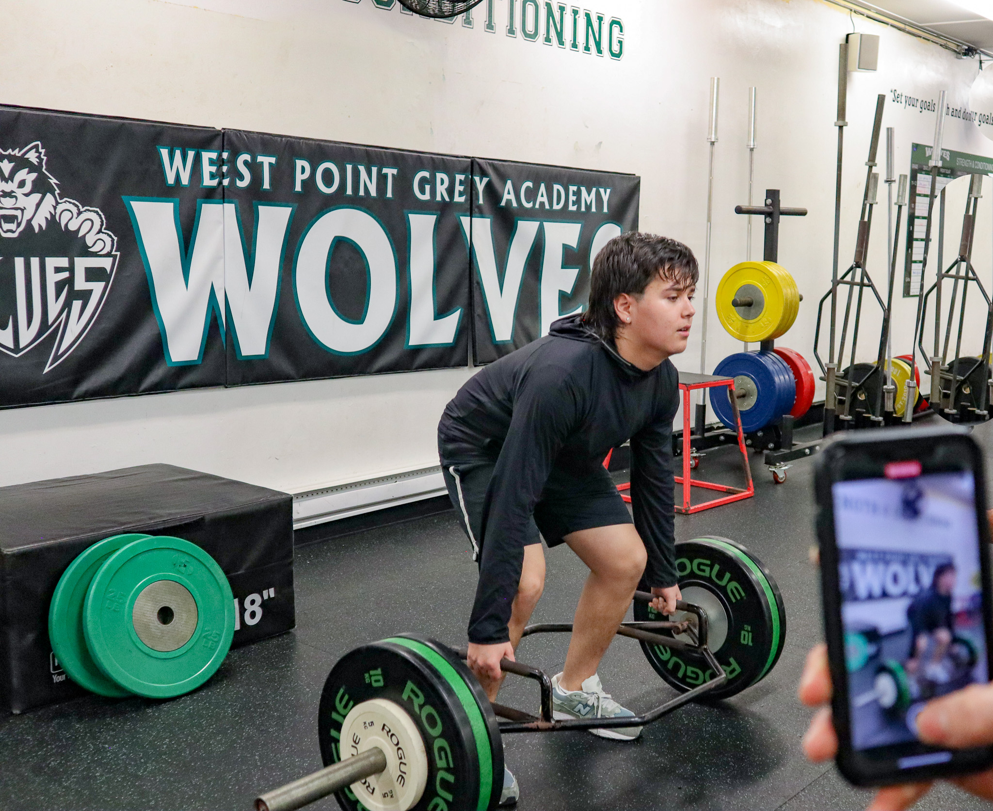 Image of a youth athlete performing a deadlift at Saltus Performance