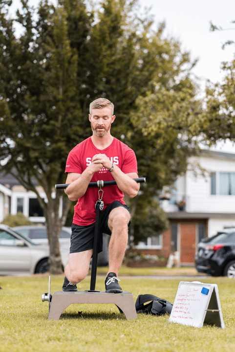 Sean DelBen, coach at saltus performance performing flywheel training