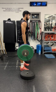 Athlete performing a deadlift at Saltus Performance